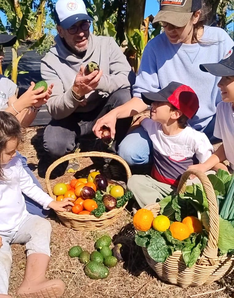 Picking fresh organic produce at Ellia's Garden